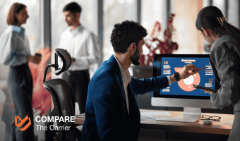 Logistics team reviewing CRM data on a computer screen