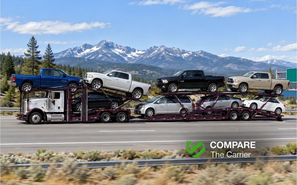 Open auto transport carrier hauling several cars on a U.S. interstate highway during an interstate move.
